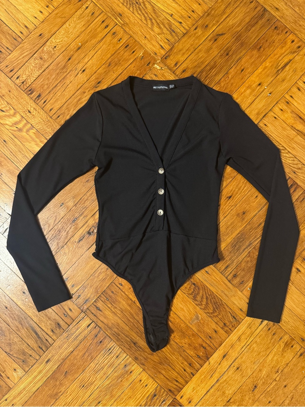 PrettyLittleThing Black Long Sleeve V-Neck Button Bodysuit